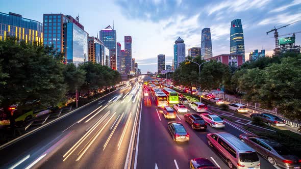 Time lapse of busy freeway traffic at night in beijing city，china