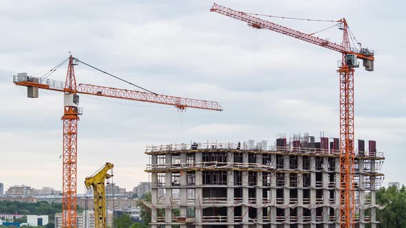 The process of building a monolithic house. Cranes and workers / Videohive, Stock footage, Buildings