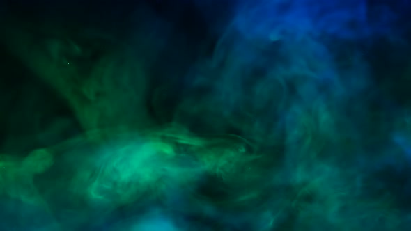 Abstract Green and Blue Smoke in Slow Motion