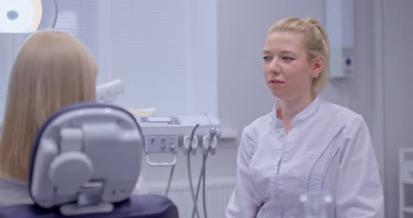 Doctor Advises the Patient About Oral Hygiene