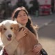 Close Up Portrait of Pretty Disabled Invalid Asian Girl Sitting on Wheelchair and Petting a Guide - VideoHive Item for Sale