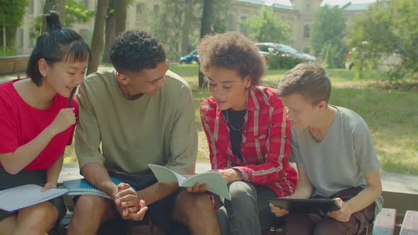 Portrait of Diverse Multiethnic University Students Learning Together Outdoors