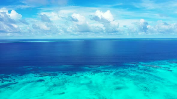 Aerial top view nature of beautiful shore beach holiday by aqua blue water and white sand background