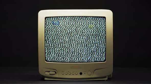 Old Retro Square Television Screen with Ripples and Interference on Black Background