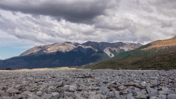 Grey Clouds over Alpine Mountains Valley in Sunny Summer in New Zealand Wild Nature