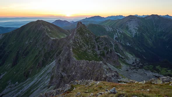 A Beautiful Timelapse of the Sunrise in Panorama of Mountain Peaks in the Hight Tatras