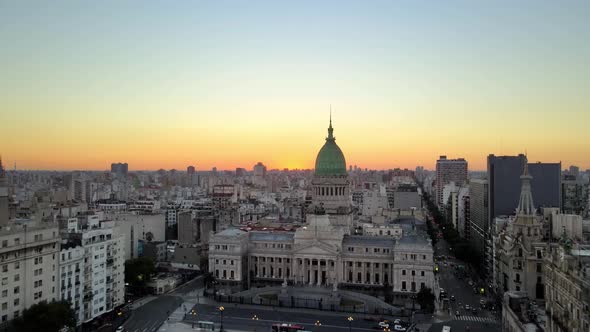 Aerial dolly in of Argentine Congress building with green bronze dome in Balvanera neighborhood at s