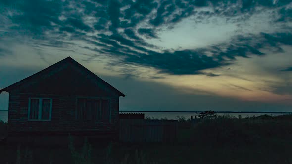 TimeLapse of Old Wooden House By the Sea