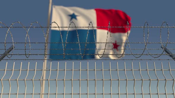 Barbed Wire Against Waving Flag of Panama