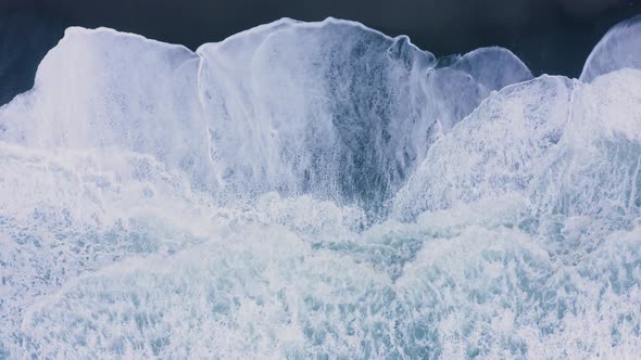 Ocean wave splash into the sand 