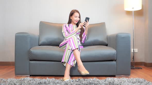 Young asian woman use smart phone