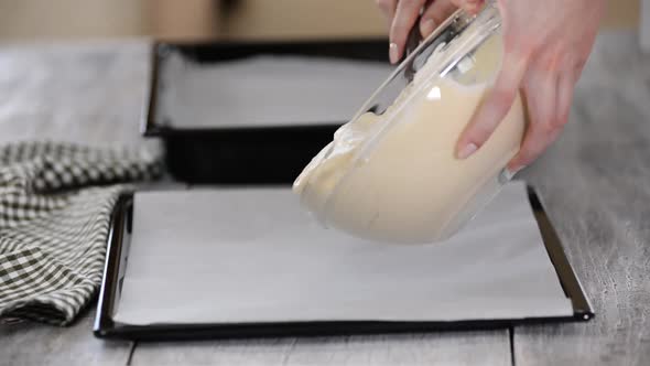 Cake Batter Pouring Into Baking Dish. Home Baking, Woman Pour Dough Onto Baking Sheet