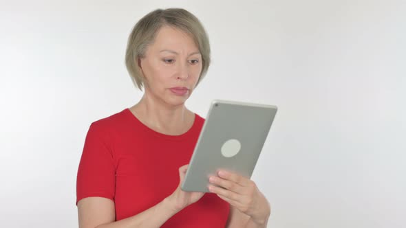 Old Woman Using Digital Tablet on White Background