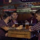 Guys chatting while drinkging a beer in a bar in Argentina - VideoHive Item for Sale