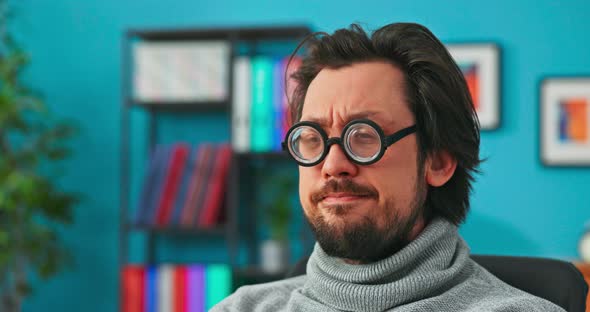 Strange Scary Funny Company Employee Focused on Computer Until Suddenly He Turns Head Looks at