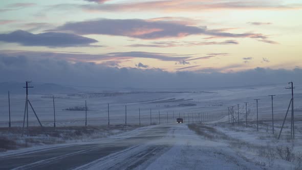 Winter Blizzard at Sunset with Track 