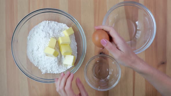 Cracking Egg Into Bowl