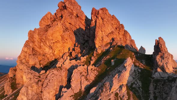 Dolomites mountains peaks on a summer sunrise