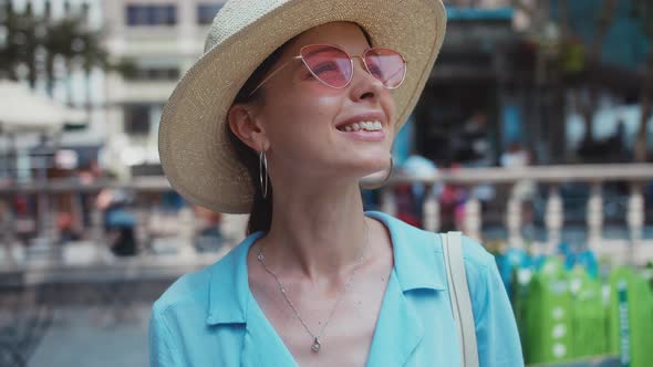 Smiling attractive woman in the park