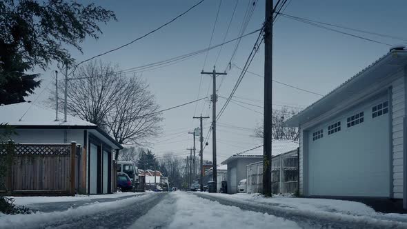 Alley Behind Houses On Snowy Winter Day