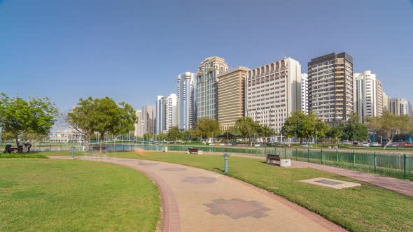 Corniche Boulevard Beach Park Along the Coastline in Abu Dhabi Timelapse Hyperlapse with Skyscrapers