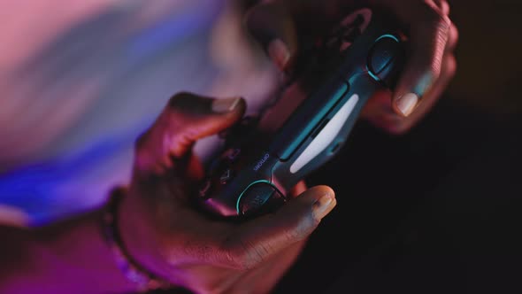 Close Up, Hands of Black Man Holding Video Game Joystick