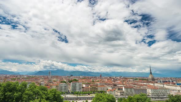 Timelapse daytime Turin Italy, town wake up, colorful dramatic sky