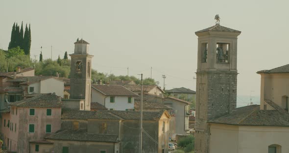 Full shot, Scenic view of Stone, brick village of Malcesine in Italy next to the Garda Lake.