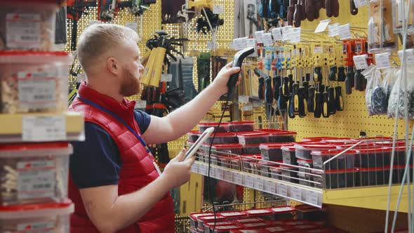 Man Working at Hardware Store