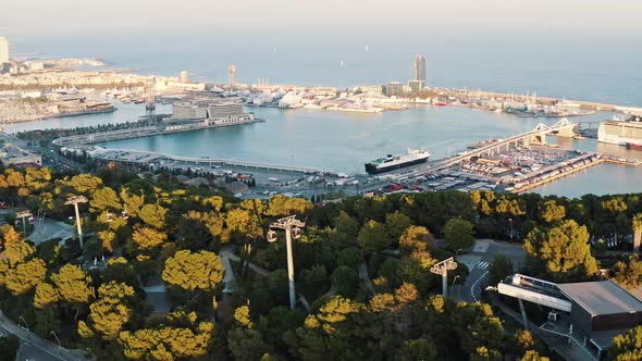 Aerial View of Barcelona Cityscape Marinas and Yacht Harbors Fishing Port Cableway on Montjuic Hill