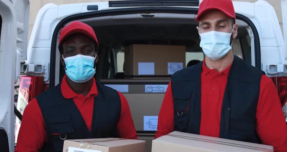 Delivery men wearing face protective masks for coronavirus outbreak