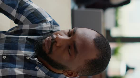 Vertical Video Portrait of African American Person Smiling in Office