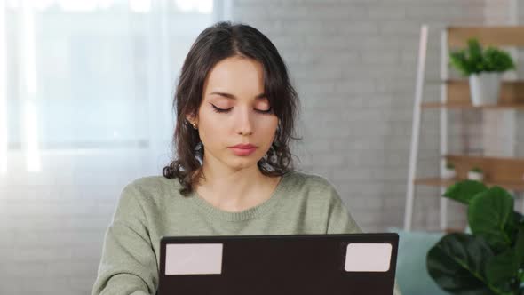 Stressed Woman Feeling Tired Worried About Work Problem Looking at Laptop Screen