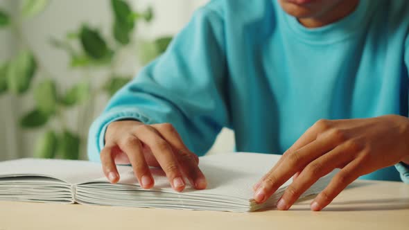 African American Man Reading Braille Book Closeup