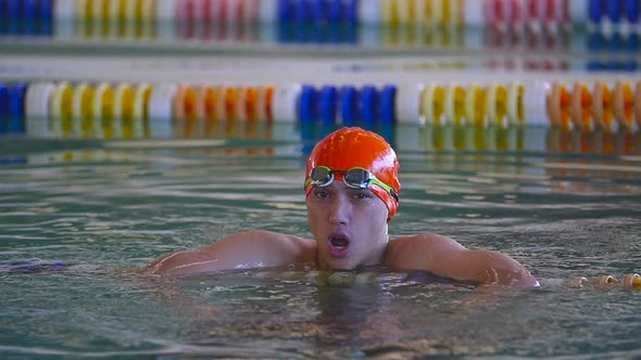 Man Resting After Swimming