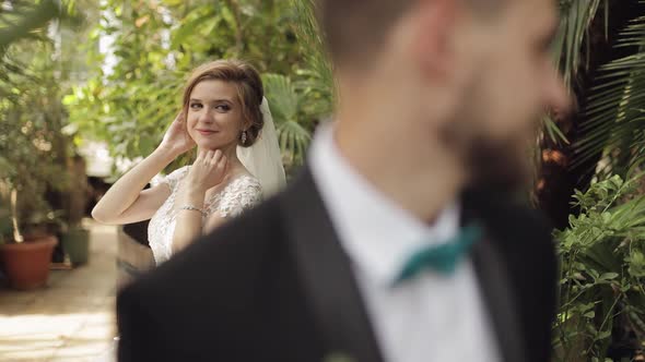 Newlyweds. Caucasian Groom with Bride in the Park. Wedding Couple. Happy Family