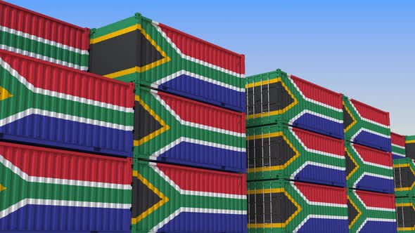 Container Yard Full of Containers with Flag of South Africa