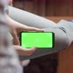 Young Woman at Home Lyung and Use Smartphone with Green Screen - VideoHive Item for Sale