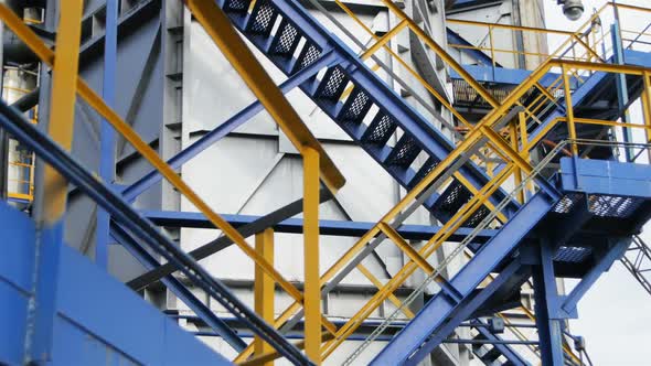 Motion Past Blue and Yellow Stairs Around Construction