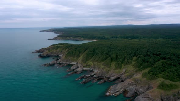 Drone flight above a picturesque rocky coastline