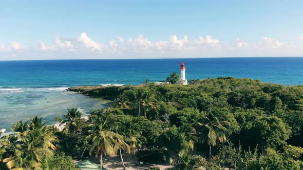 Island with Palms and a White Lighthouse