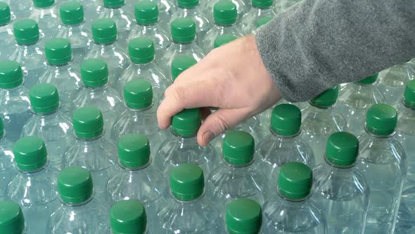 Water Bottles Picked Up Closeup