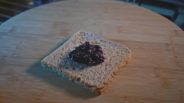 Whole Wheat Bread With Blueberry Jam Spread. Preparing Pre-workout Snack. close up