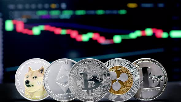 Coin Bitcoin, Ethereum, Litecoin, Shiba and Ripple on background cryptocurrency trading chart