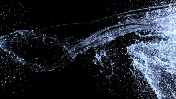 Super Slow Motion Shot of Water Splash at 1000Fps Isolated on Black Background