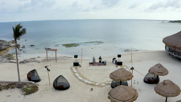 Young Couple Practicing Live Concert Show on a Beach By the Caribbean Sea