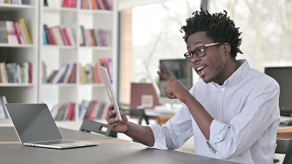 Video Chat on Tablet By African Man