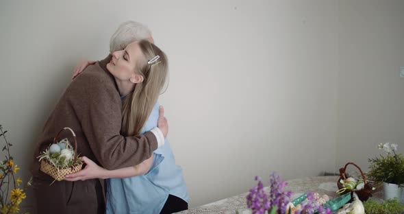 Happy Easter - Young Woman Give Easter Gift To Grandfather