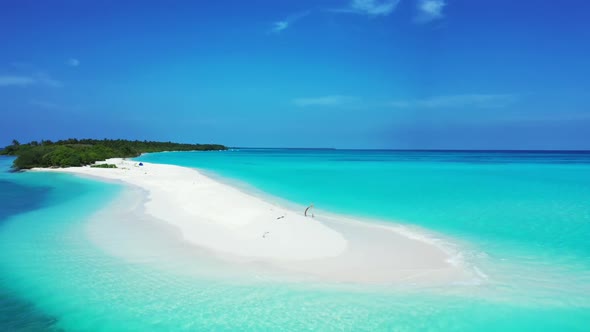 Aerial tourism of relaxing lagoon beach break by blue lagoon and white sandy background of journey n
