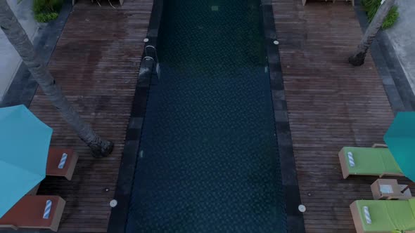 Aerial view of swimming pool between bungalow, Gili Trawangan island, Indonesia.